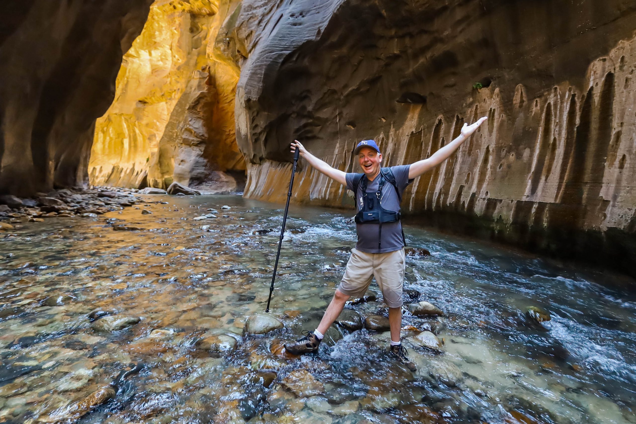 Photographer Tim McMahan exploring the Narrows at Zion National Park