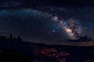 The Milky Way arches over Cedar Breaks National Monument