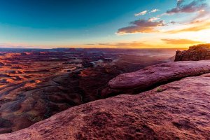 The sun sets at Green River Overlook in Canyonlands National Park