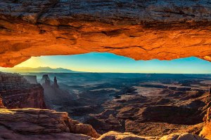 Under the Mesa Arch at sunrise in Canyonlands.