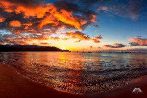 A panoramic sunset over Kauai's beautiful Hanalei Bay.